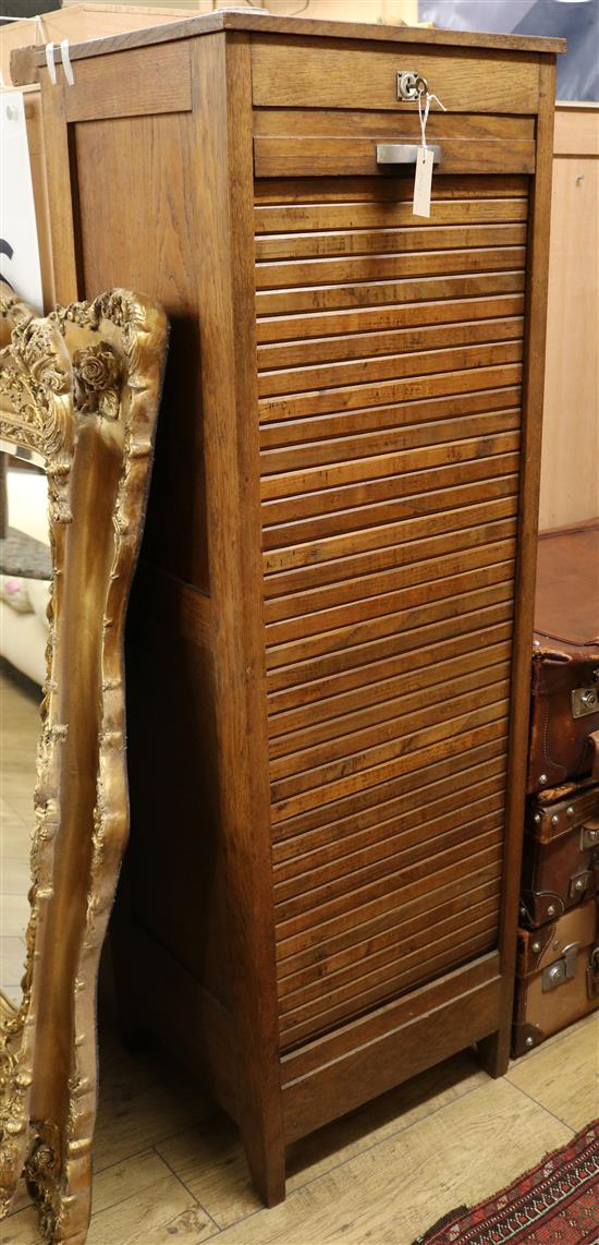 A tambour shutter filing cabinet W.48cm